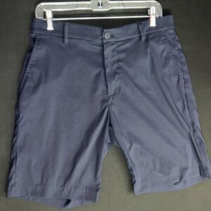 Tommy Hilfiger Sport Shorts size 32 with a 9”‎ inseam Navy Blue.
